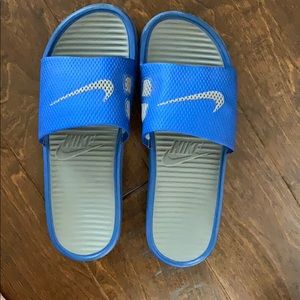 Blue nike slides